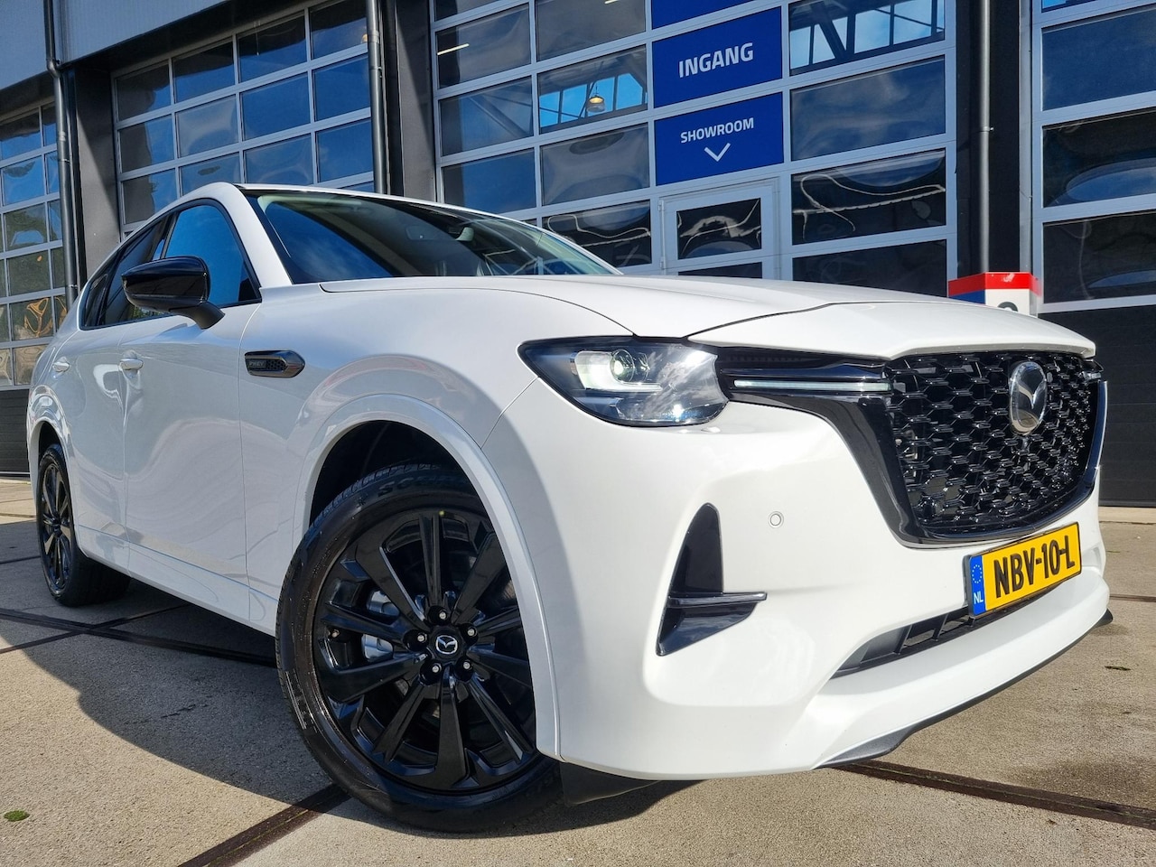 Mazda CX-60 - 2.5 e-SkyActiv PHEV AWD Homura LEER / BOSE AUDIO / HEAD-UP / 360° CAMERA / STOELVENTILATIE - AutoWereld.nl