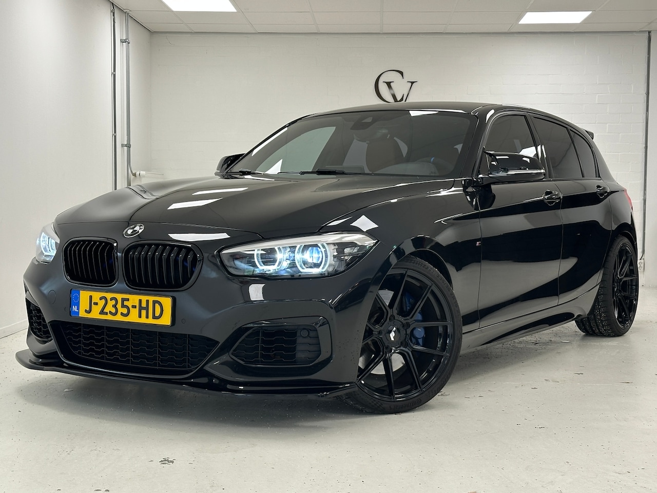 BMW 1-serie - M140i High Executive | 460PK | M Performance uitlaat | Eibach onderstel | - AutoWereld.nl
