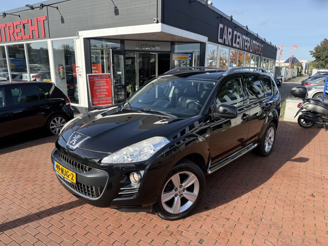 Peugeot 4007 - 2.2 HDiF Platinum 7p airco navi trekaak 4x4 - AutoWereld.nl