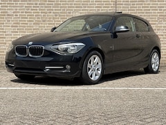 BMW 1-serie - 114i Business | Pano | Airco | Cruise | PDC |