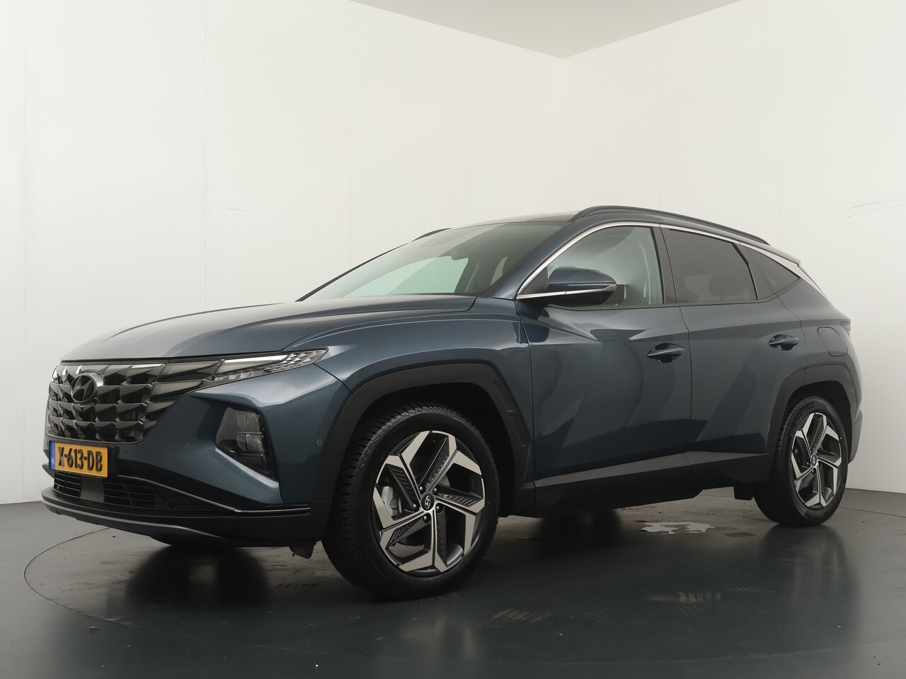 Hyundai Tucson - 1.6 T-GDI PHEV 265pk Premium 4WD | Trekhaak | SOH 97,4% | Stuur & Stoel Verwarming // verk - AutoWereld.nl