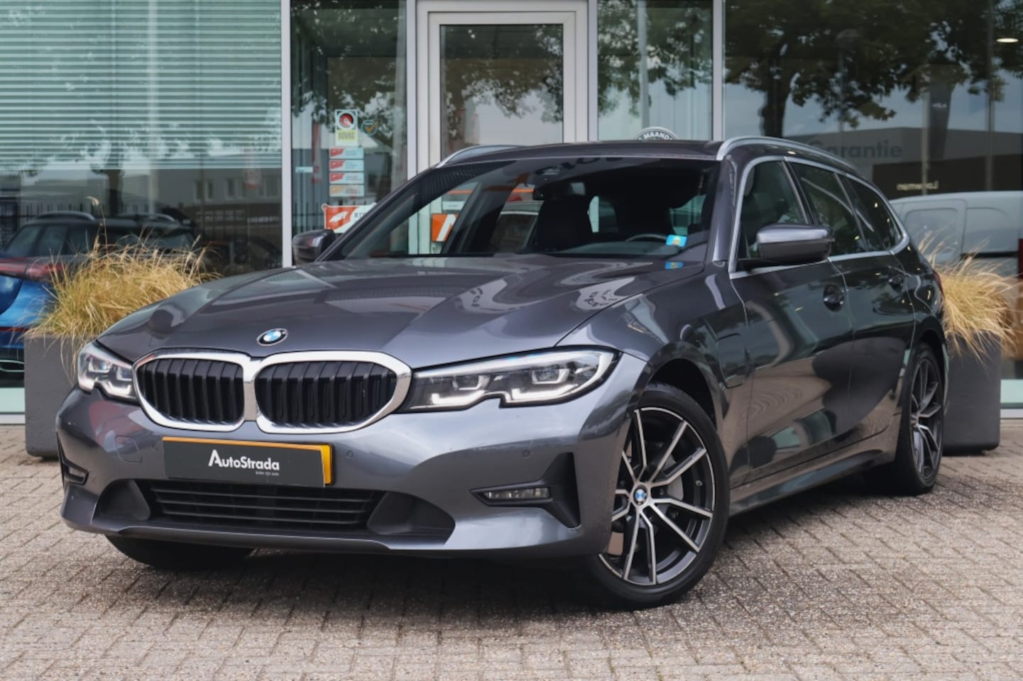 BMW 3-serie Touring - (G21) 330e 292pk Aut SoH 91% | Harman/Kardon | Cruise | Carplay | Keyless | Stoelverwarmin - AutoWereld.nl