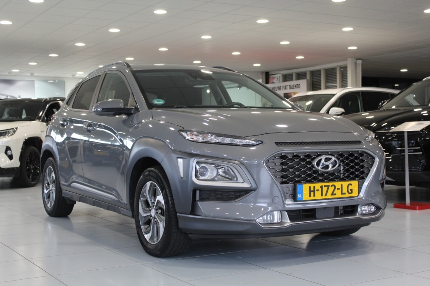 Hyundai Kona - 1.6 GDI HEV Fashion/CARPLAY/CAMERA/TREKHAAK - AutoWereld.nl
