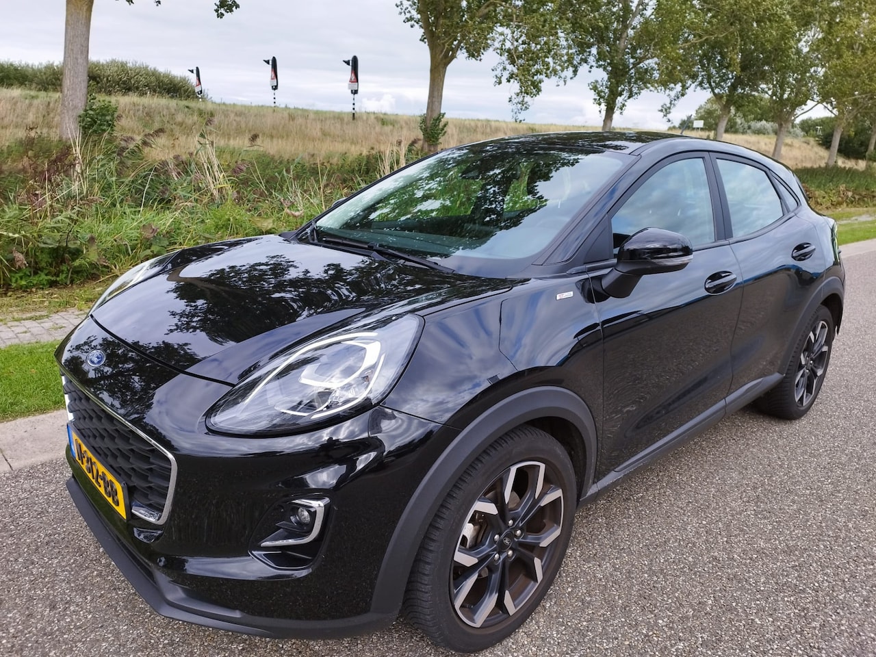 Ford Puma - 1.0 EcoBoost ST Line Optic ** Airco ** Cruise ** ALL Season ** TOPSTAAT ** Trekhaak - AutoWereld.nl