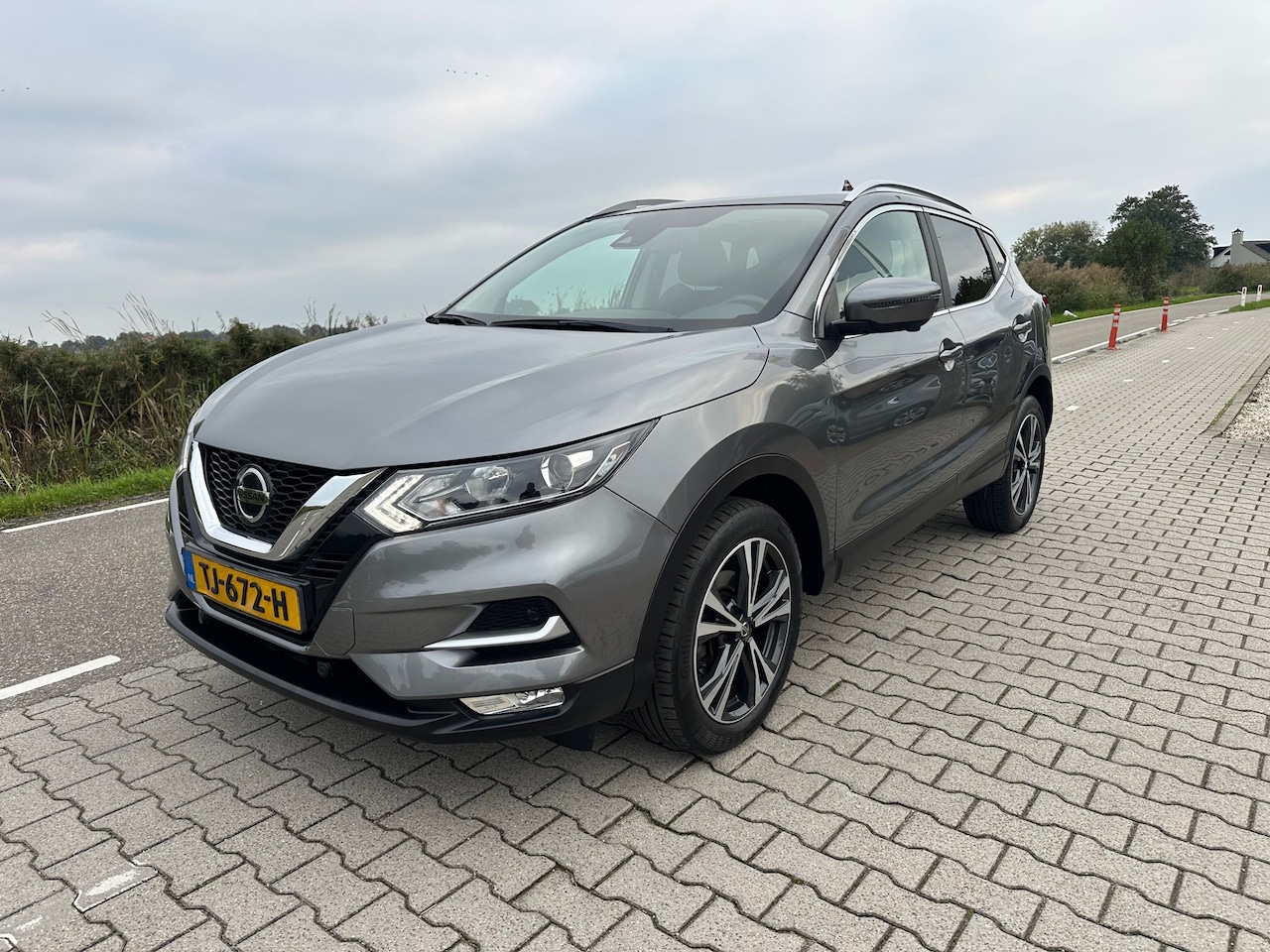 Nissan Qashqai - 1.2 N-Connecta 360* Camera, Panorama dak, Lane Assist, Cruisecontrol, Navigatie - AutoWereld.nl