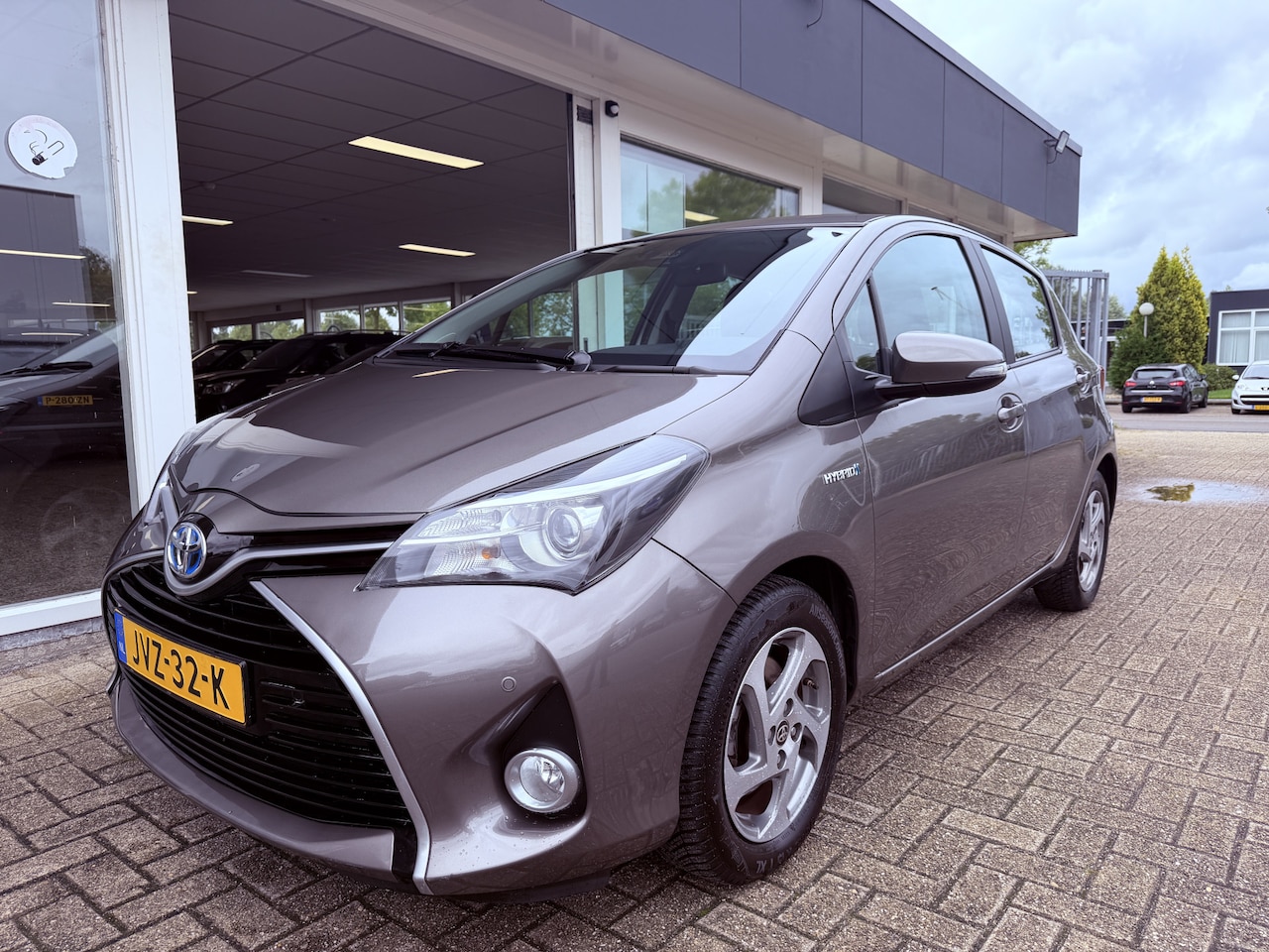 Toyota Yaris - 1.5 Hybrid Dynamic Navi Cruisecontrol LM velgen - AutoWereld.nl