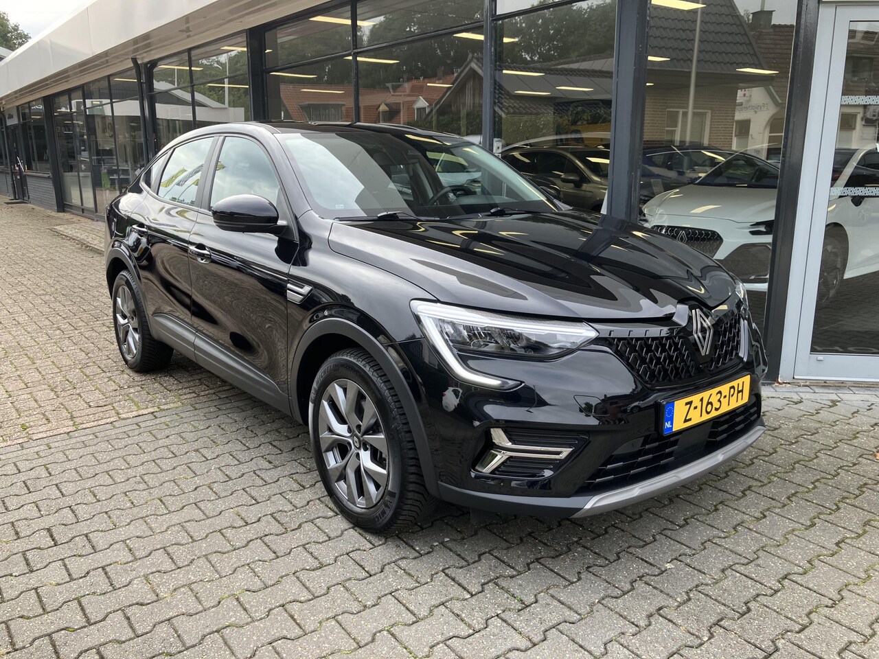 Renault Arkana - 1.6 E-Tech full hybrid 145 evolution * CAMERA / TREKHAAK * - AutoWereld.nl