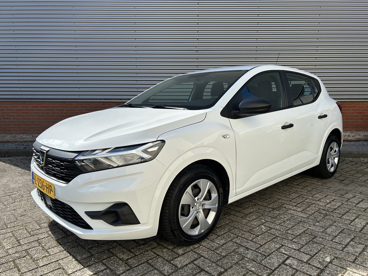 Dacia Sandero - 1.0 TCe 90 Essential | Airco | Parkeersensoren | Cruise Control | Goed onderhouden | - AutoWereld.nl