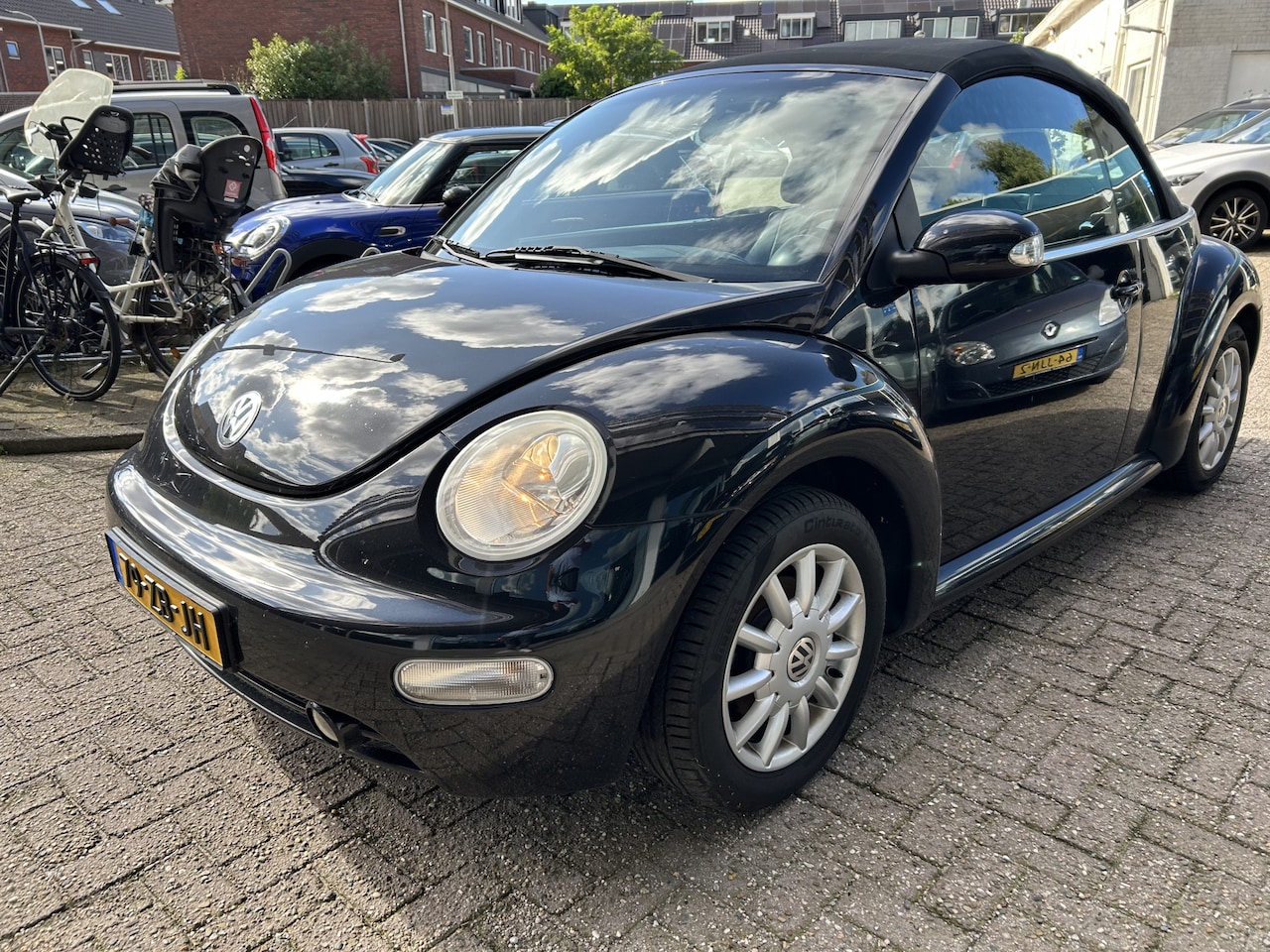 Volkswagen New Beetle Cabriolet - 2.0 Highline zwart leder airco nwe apk - AutoWereld.nl
