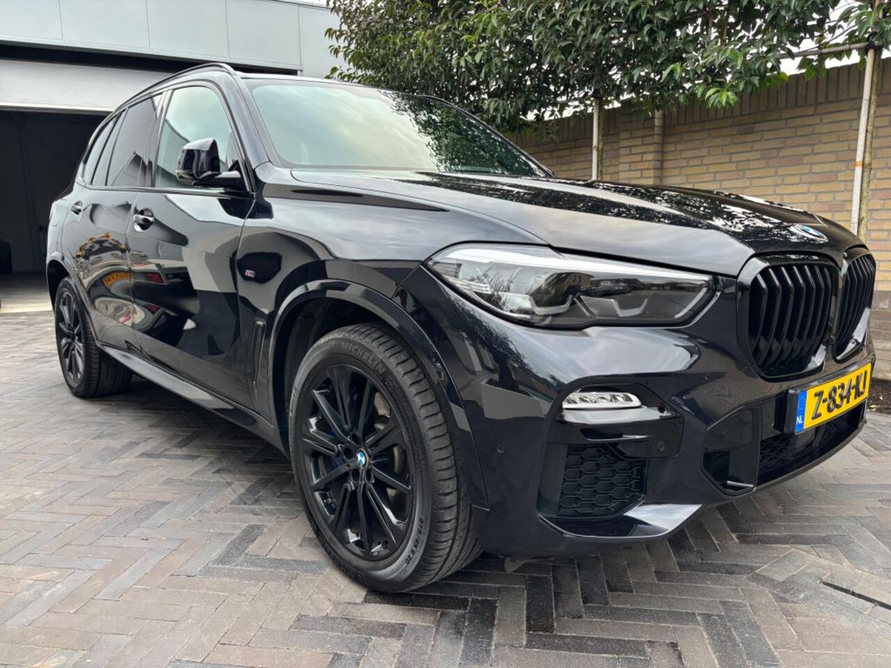 BMW X5 - XDrive45e Carbon zwart M-pakket PANORAMA 394 pk - AutoWereld.nl