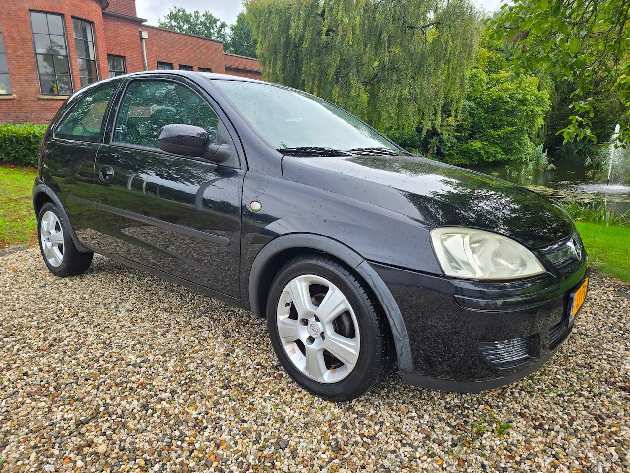 Opel Corsa - 1.2-16V Enjoy Airco - AutoWereld.nl