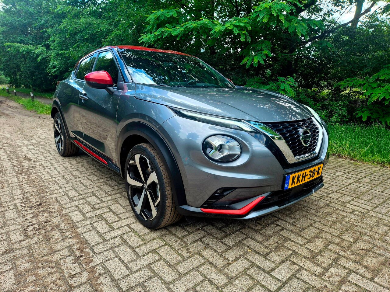 Nissan Juke - 1.0 DIG-T Tekna / BOSE geluid / 19 inch - AutoWereld.nl
