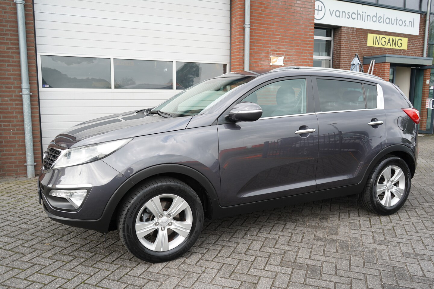 Kia Sportage - 1.6 GDI X-ECUTIVE PLUS PACK NL AUTO ANDROID-APPLECARPLAY NAVI TREKHAAK ECC AIRCO CRUISECON - AutoWereld.nl