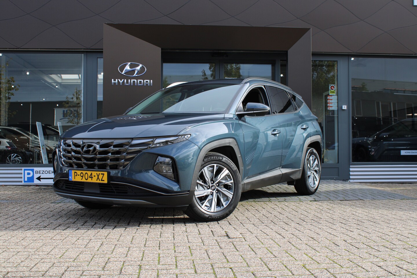 Hyundai Tucson - 1.6 T-GDI HEV 230pk Comfort | Camera | Climate controle | Cruis control | Carplay | Naviga - AutoWereld.nl