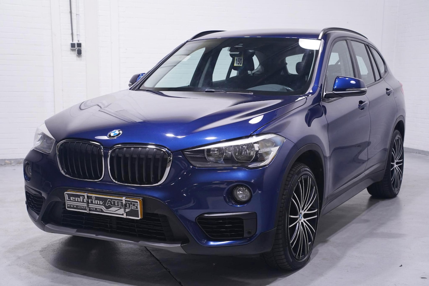 BMW X1 - sDrive18i Advantage Navi Sportstoelen Clima Stoelverwarming PDC v+a 19 Inch velgen - AutoWereld.nl