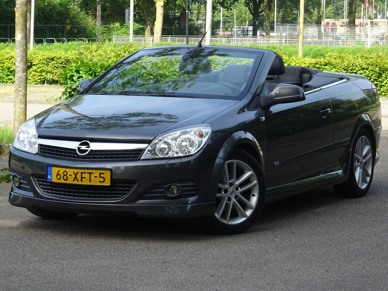 Opel Astra TwinTop - 1.8 Cosmo NAP/LEER/NAVI/AC/CRUISE/PDC/APK - AutoWereld.nl