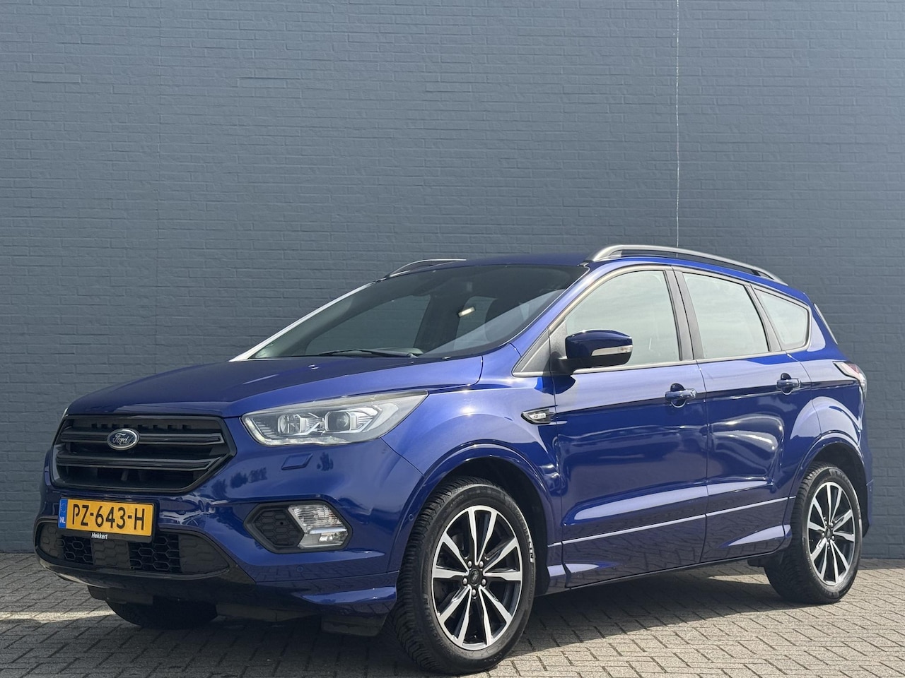 Ford Kuga - 1.5 EcoBoost ST Line navigatie | Half ledere bekleding | Climate Control | Parkeersensoren - AutoWereld.nl