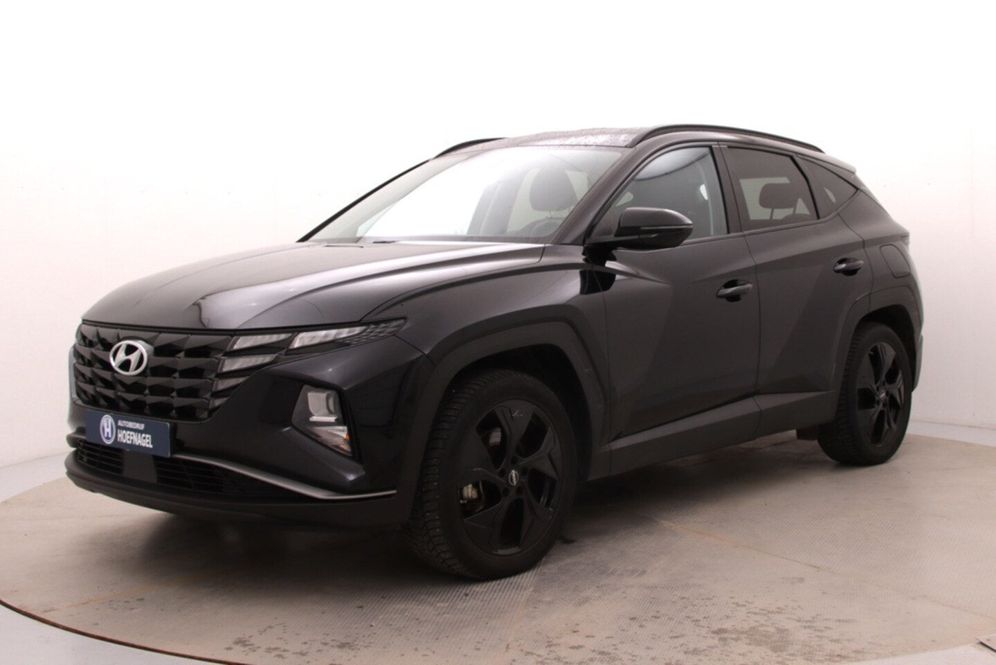 Hyundai Tucson - 1.6 T-GDI PHEV Comfort 4WD | Trekhaak | Camera | Adaptive Cruise | Stoelverwarming | CarPl - AutoWereld.nl