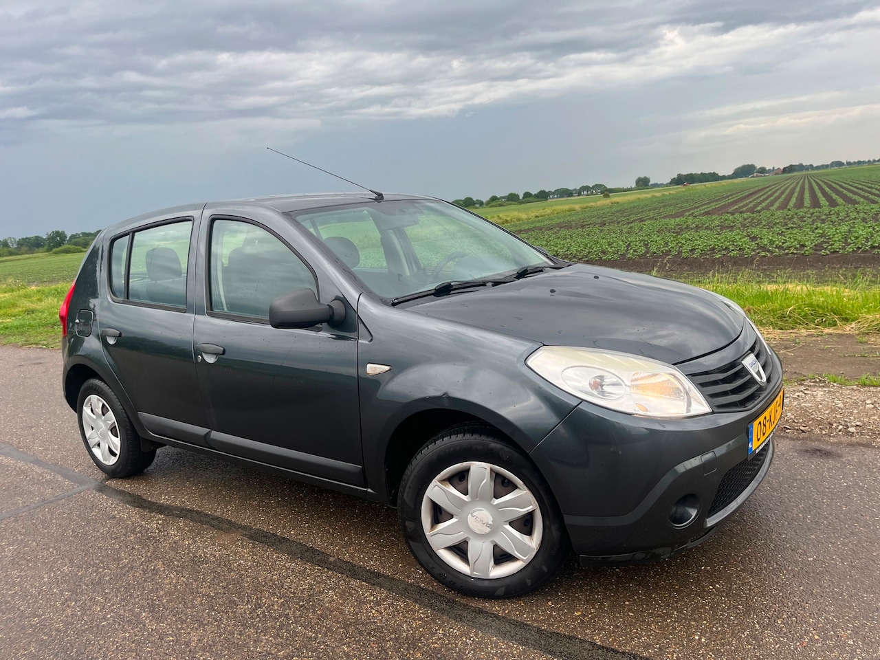 Dacia Sandero - 1.2 Ambiance / 145.000 nap airco - AutoWereld.nl