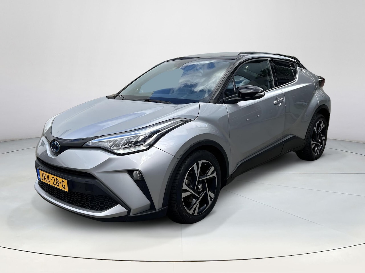 Toyota C-HR - 1.8 Hybrid Style | Apple Carplay & Android Auto (Navi) | Stoelverwarming - AutoWereld.nl