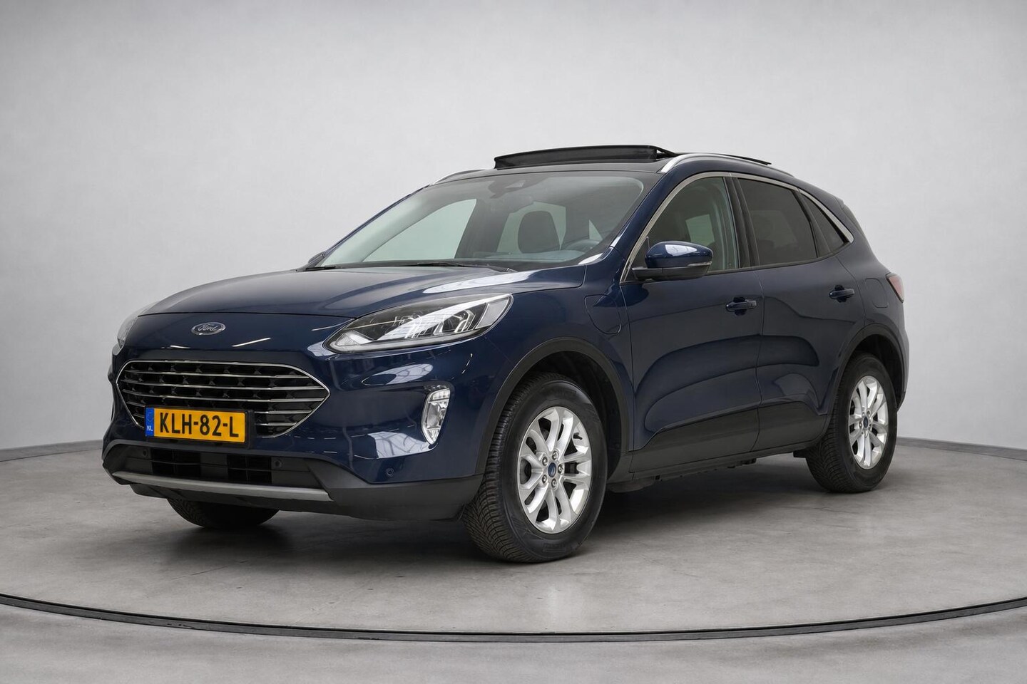 Ford Kuga - 2.5 PHEV Titanium | SoH 96% | Panoramadak | Carplay | Stoelverwarming | Keyless | Lm velge - AutoWereld.nl
