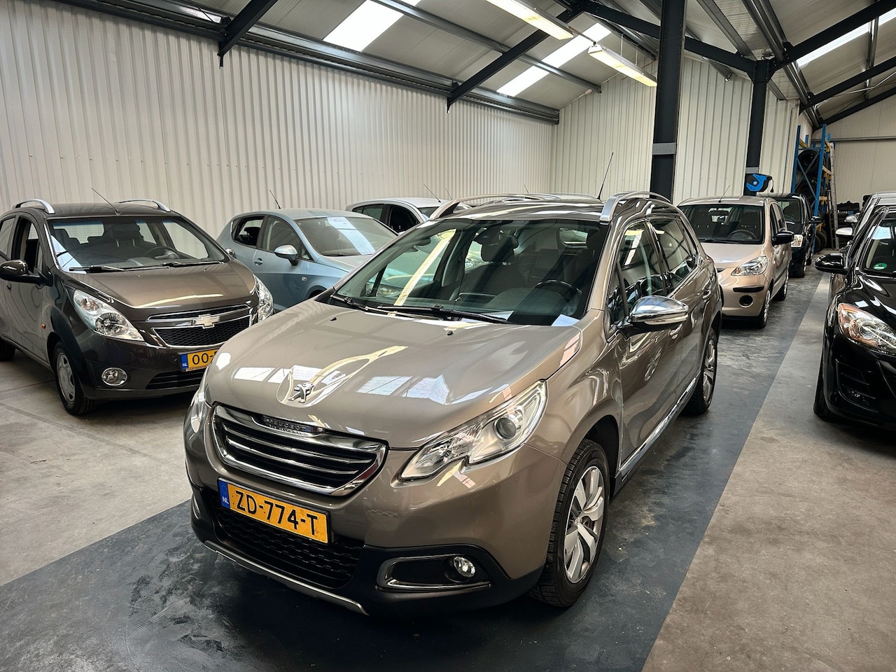 Peugeot 2008 - 1.2 VTi Allure Pack Premium Plus 1.2 VTi Allure Pack Premium Plus - AutoWereld.nl