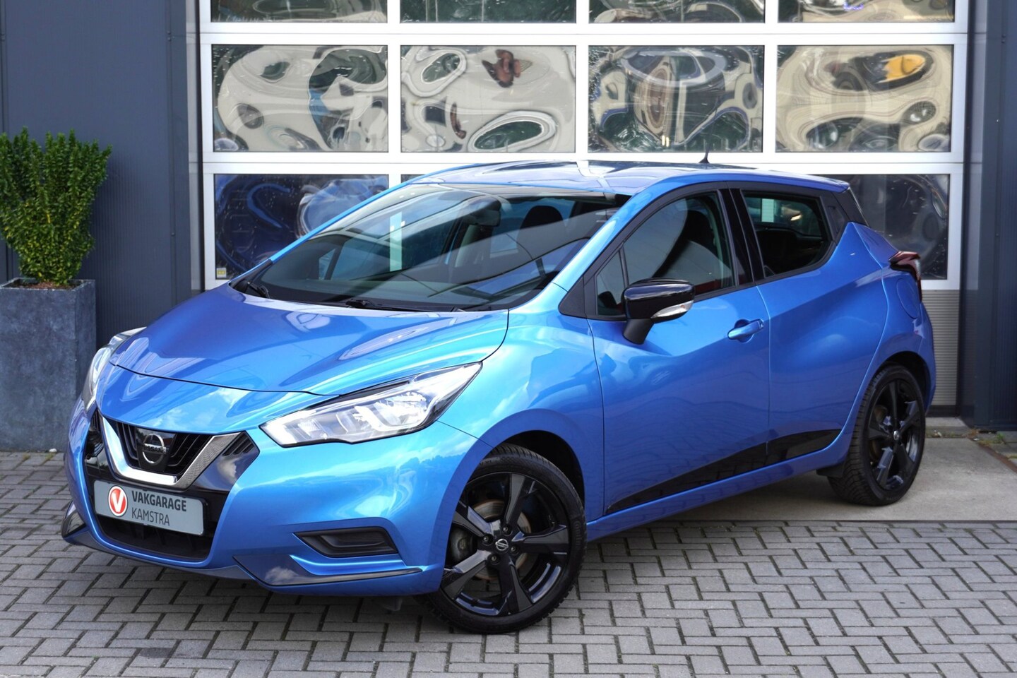 Nissan Micra - 1.0L Acenta 5-deurs NAP Airco/Cruise/Lage KMs! - AutoWereld.nl