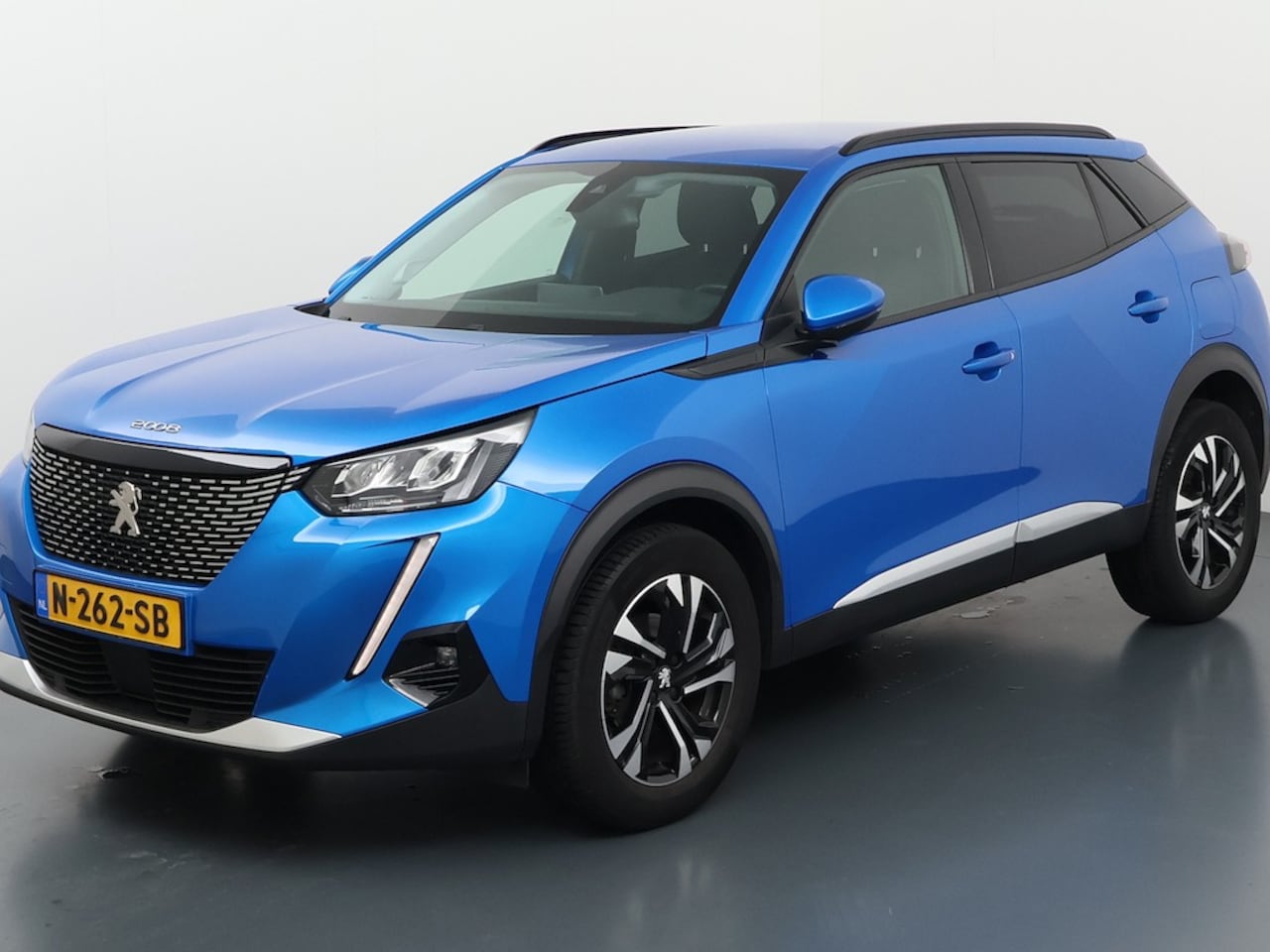 Peugeot 2008 - 1.2 PureTech Allure Pack 130PK! Cruise Control | Apple/Android Carplay || Achteruitrijcame - AutoWereld.nl