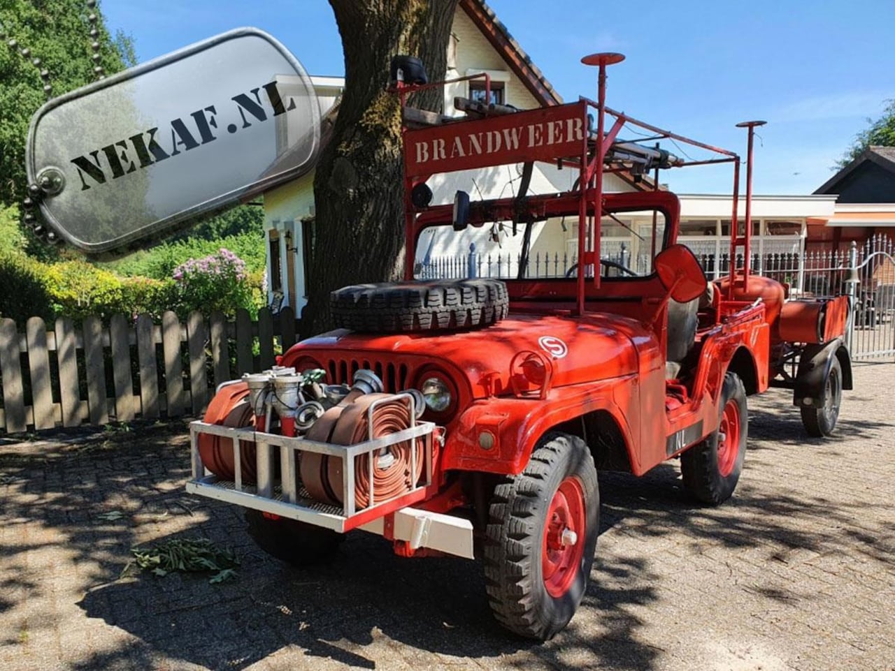 Jeep Nekaf - Willys M38a1 Brandweer auto - AutoWereld.nl