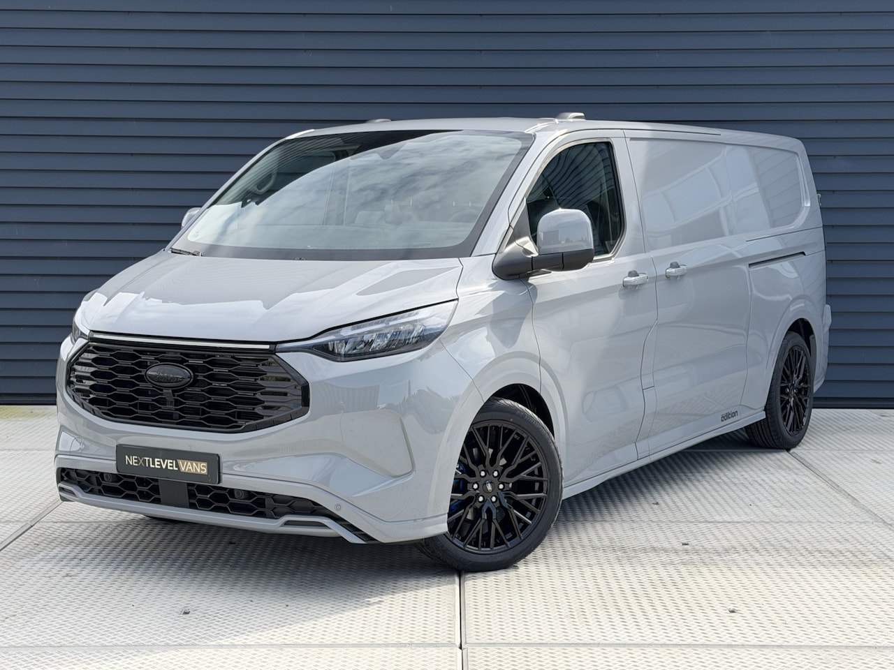 Ford Transit Custom - E-Transit 340 L2H1 Sport 71 kWh | Next Level Edition | Camera | 2x Schuifdeur | Direct lev - AutoWereld.nl
