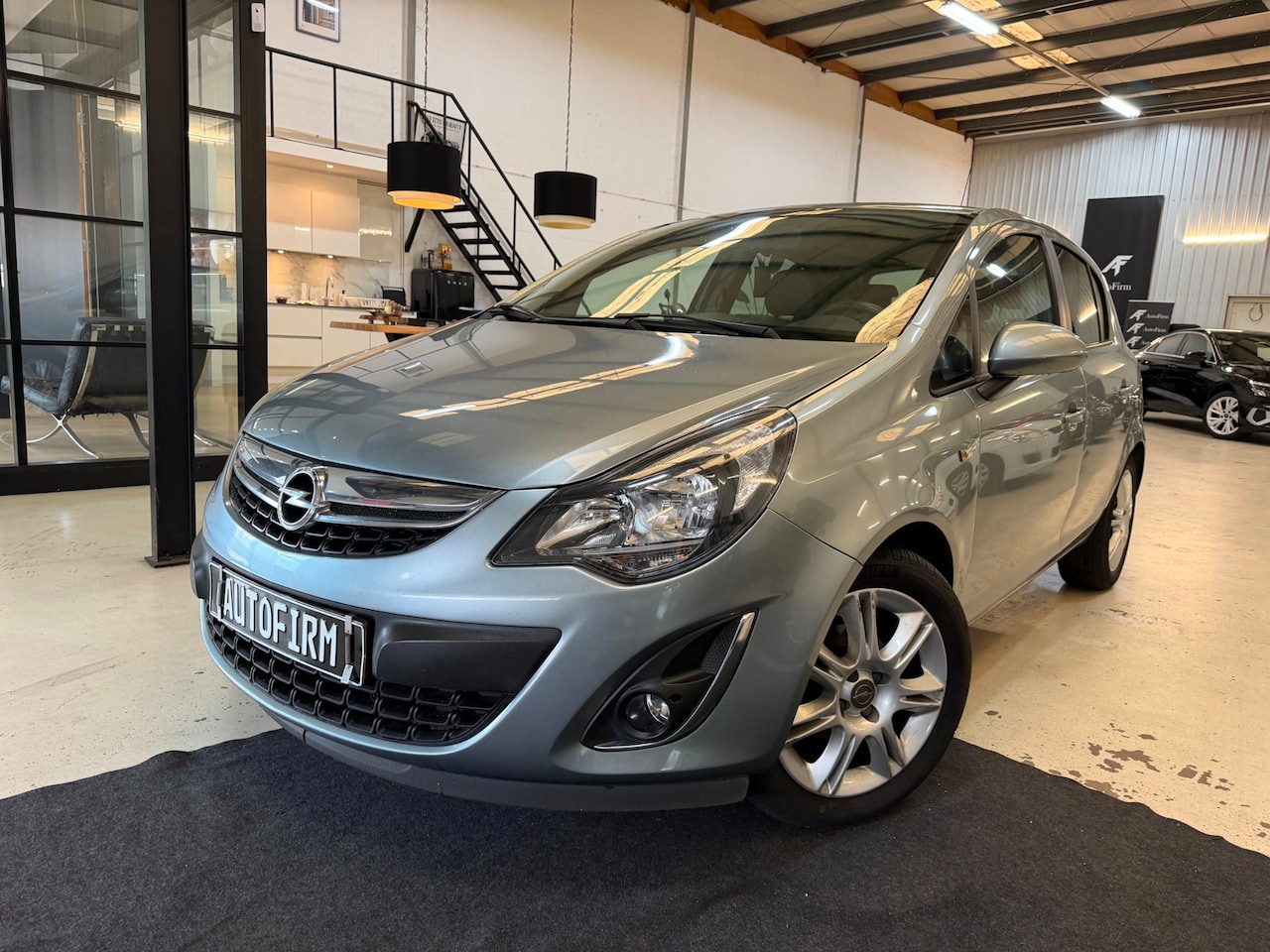 Opel Corsa - 1.2-16V BlitZ NAP Garantie Stoelverwarming PDC Bluetooth Navi Stuurverwarming - AutoWereld.nl