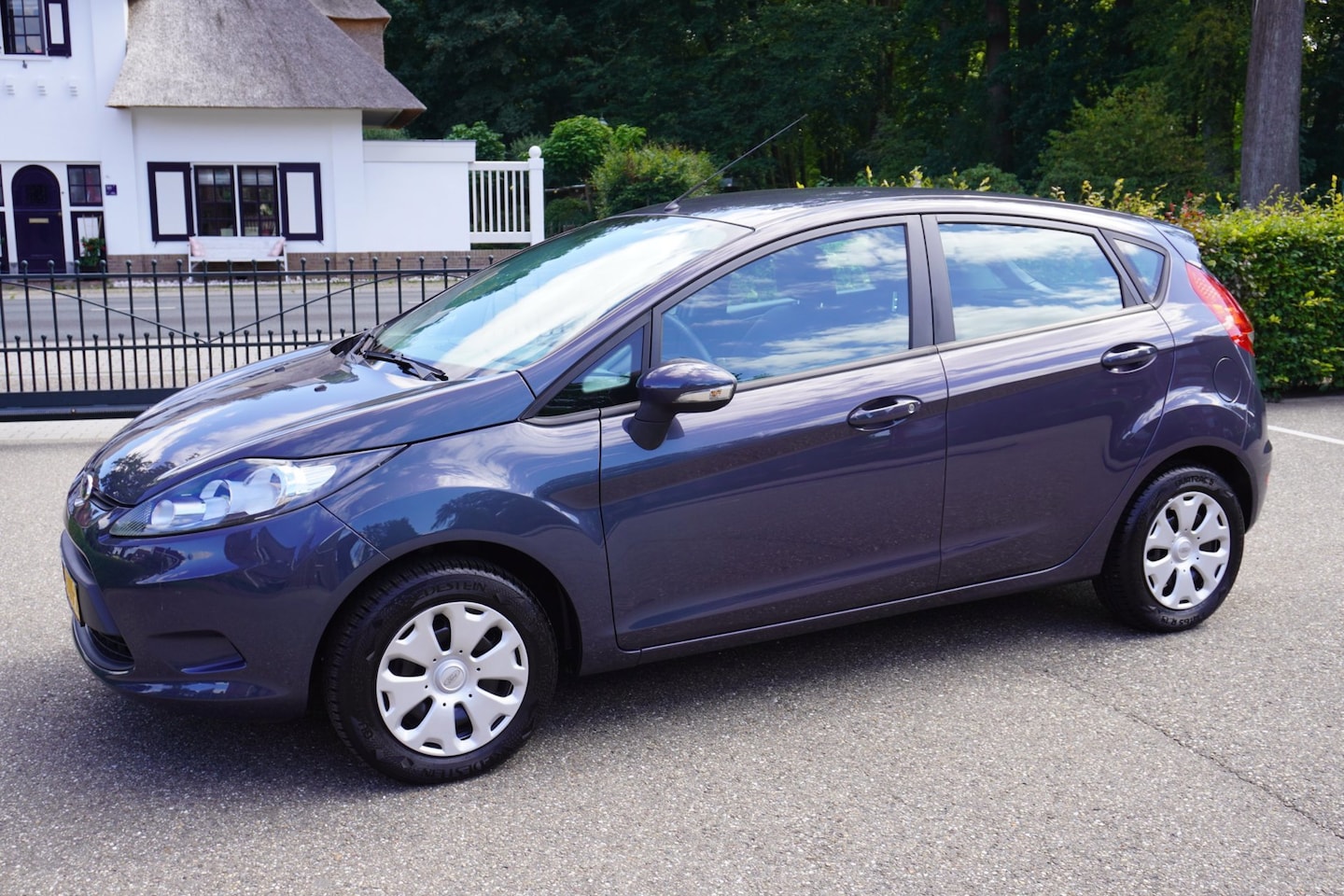 Ford Fiesta - 1.25 Limited 5 Drs Airco - AutoWereld.nl