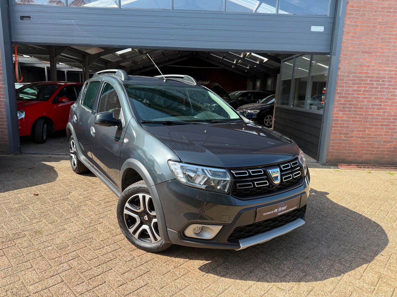 Dacia Sandero Stepway - 0.9 TCe SL Stepway|CRUISE/NAVI/BLUETOOTH| - AutoWereld.nl