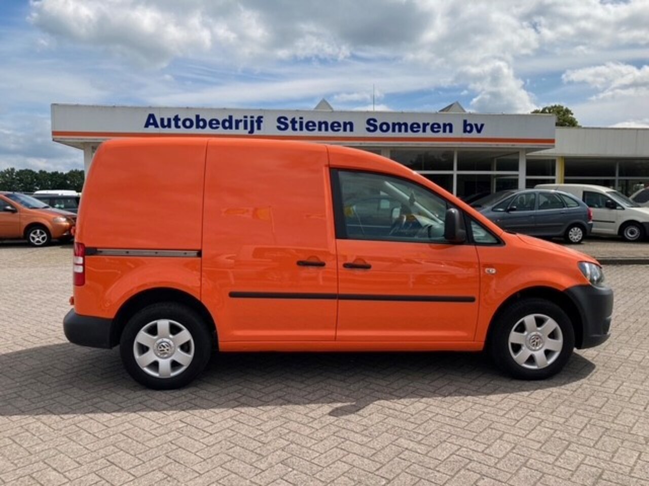 Volkswagen Caddy - 1.6 TDI Oranje HUP HUP Nederland - AutoWereld.nl