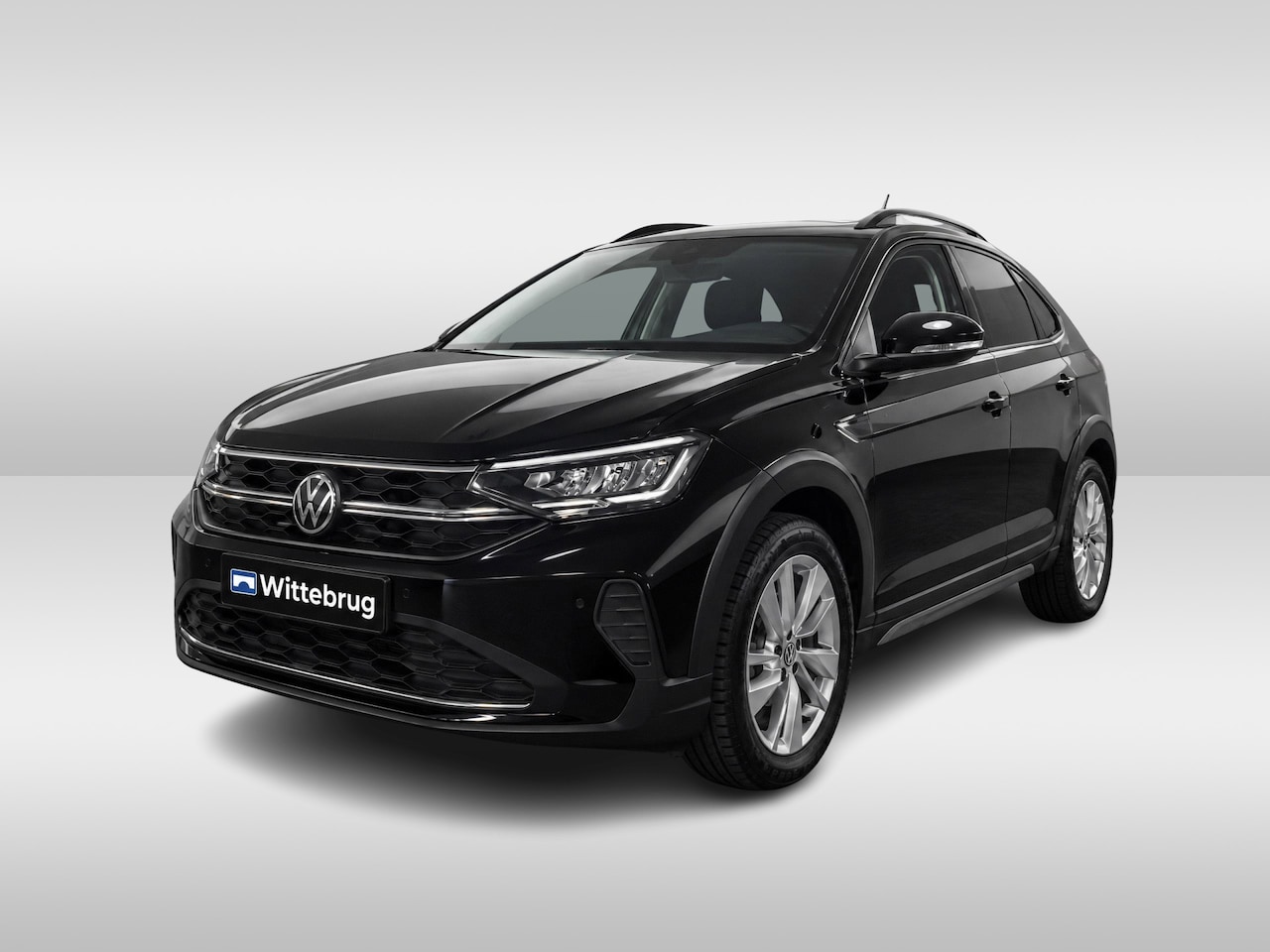 Volkswagen Taigo - 1.0 TSI Life / APP.Connect / 17"LMV / PDC v+a - AutoWereld.nl