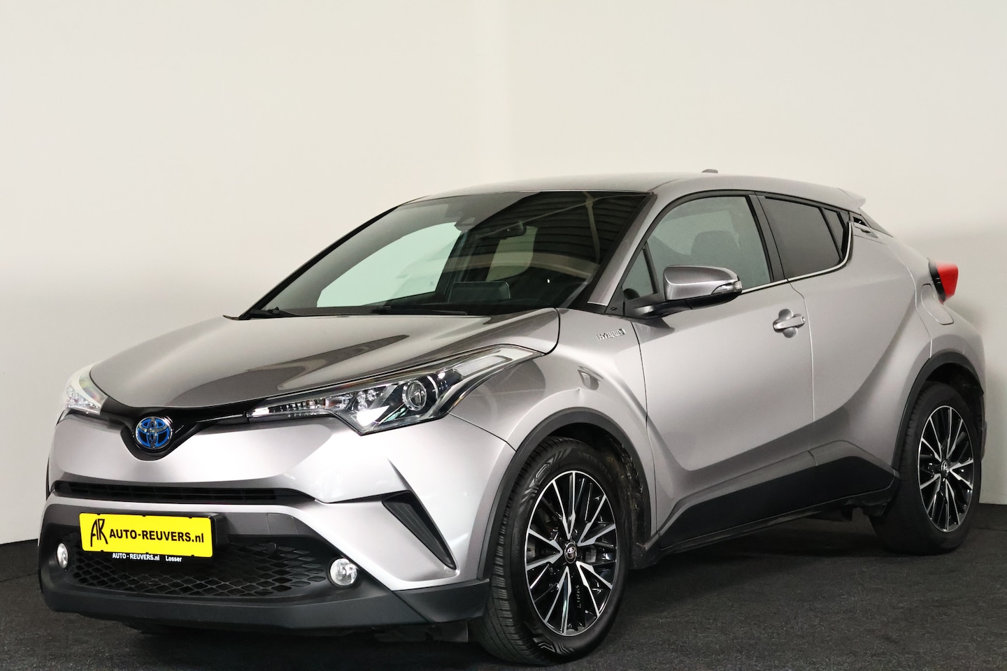 Toyota C-HR - 1.8 Hybrid Dynamic / Navi / Cam / Clima / Bluetooth - AutoWereld.nl