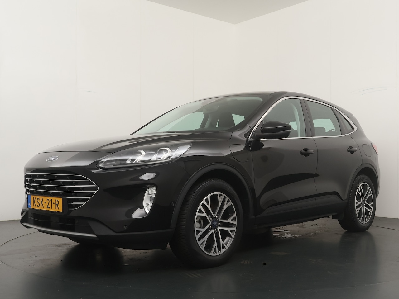 Ford Kuga - 2.5 PHEV Titanium | Adapt. Cruise I Adatp. LED | SOH 86,6% | 4 seiz. banden | Stoelverw. | - AutoWereld.nl