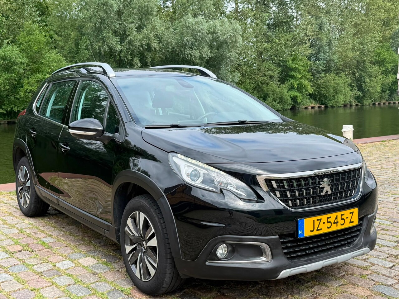 Peugeot 2008 - 1.2 PureTech Allure Automaat 1e eigenaar dealer onderhouden achteruit camera airco cruis c - AutoWereld.nl
