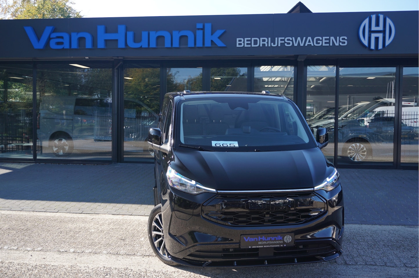 Ford Transit Custom - 340L 218PK 71KWH AWD Elektrisch JWR Edition AUT BPM VRIJ!! Apple CP, 19" LM, LED, Trekhaak - AutoWereld.nl
