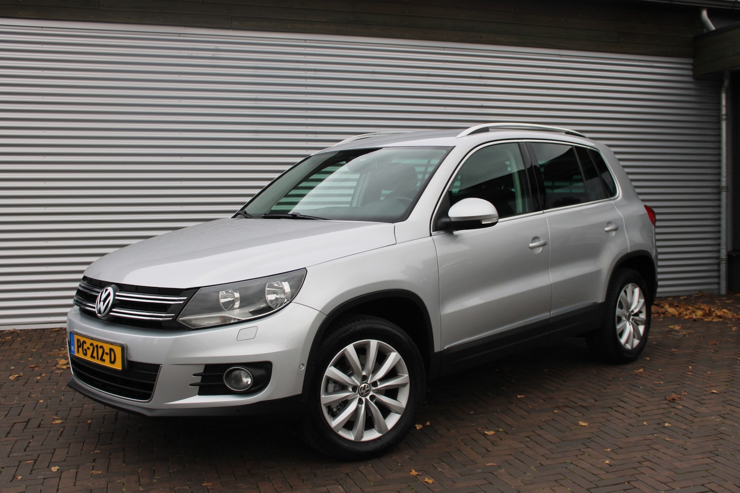 Volkswagen Tiguan - 1.4 TSI Sport&Style - AutoWereld.nl