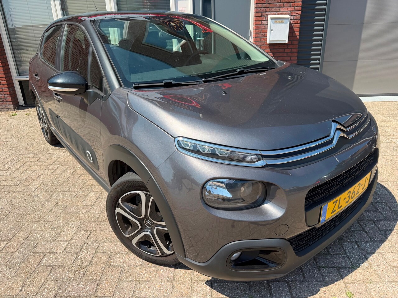 Citroën C3 - 1.2 PureTech Feel Edition / Navi / PDC / Carplay / Cruise / Clima - AutoWereld.nl