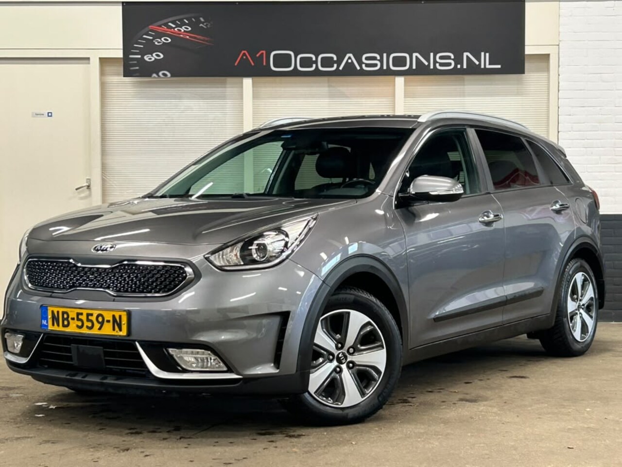 Kia Niro - 1.6 GDi Hybrid BusinessLine + NAVI + STOELVERWARMING - AutoWereld.nl