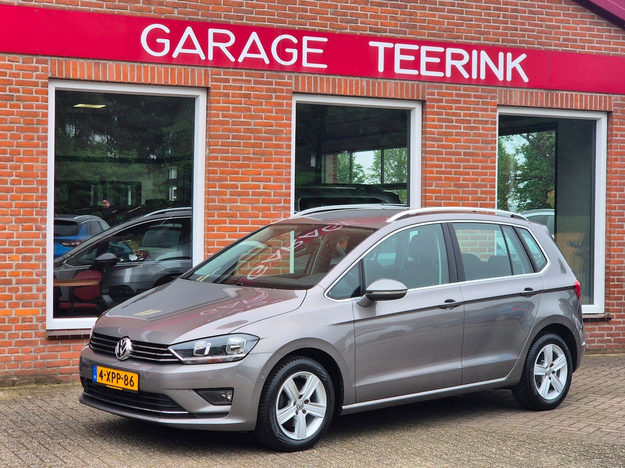 Volkswagen Golf Sportsvan - 1.2 TSI Highline 110PK 5drs clima, cruise, navi, trekhaak, pdc, parkassist - AutoWereld.nl