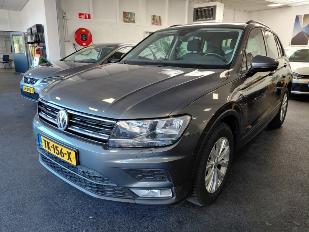 Volkswagen Tiguan - 1.4 TSI ACT | Wegklapbare trekhaak - AutoWereld.nl