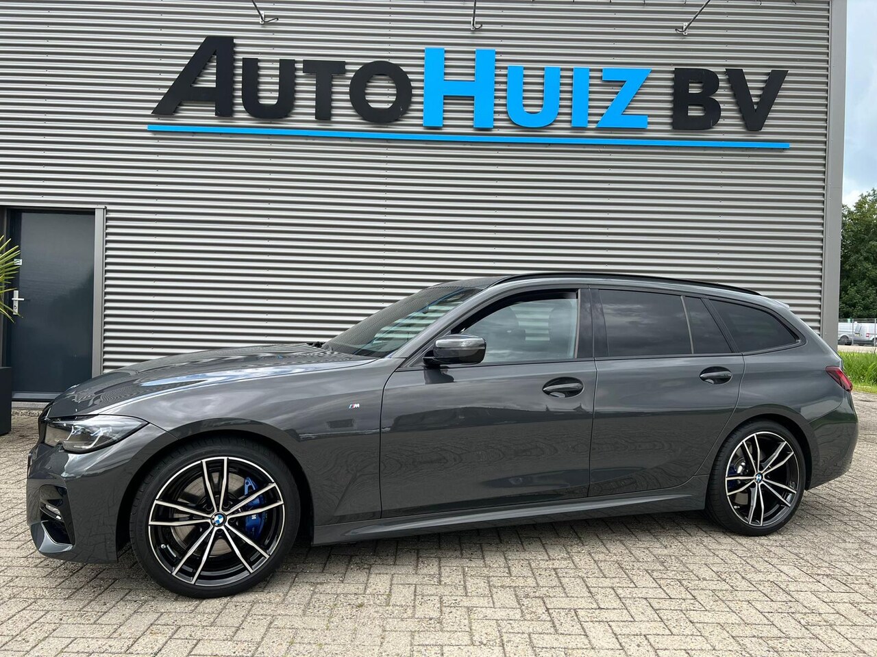 BMW 3-serie Touring - 318i High Executive M Sport Laser Licht 19 Inch Stuurwielverwarming Keyless Entry - AutoWereld.nl