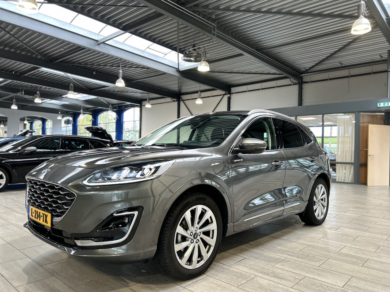 Ford Kuga - 2.5 PHEV Vignale | Adapt. Cruise | Winter Pack | SOH 86% | BLIS | 19" LMV | Camera's | B&O - AutoWereld.nl