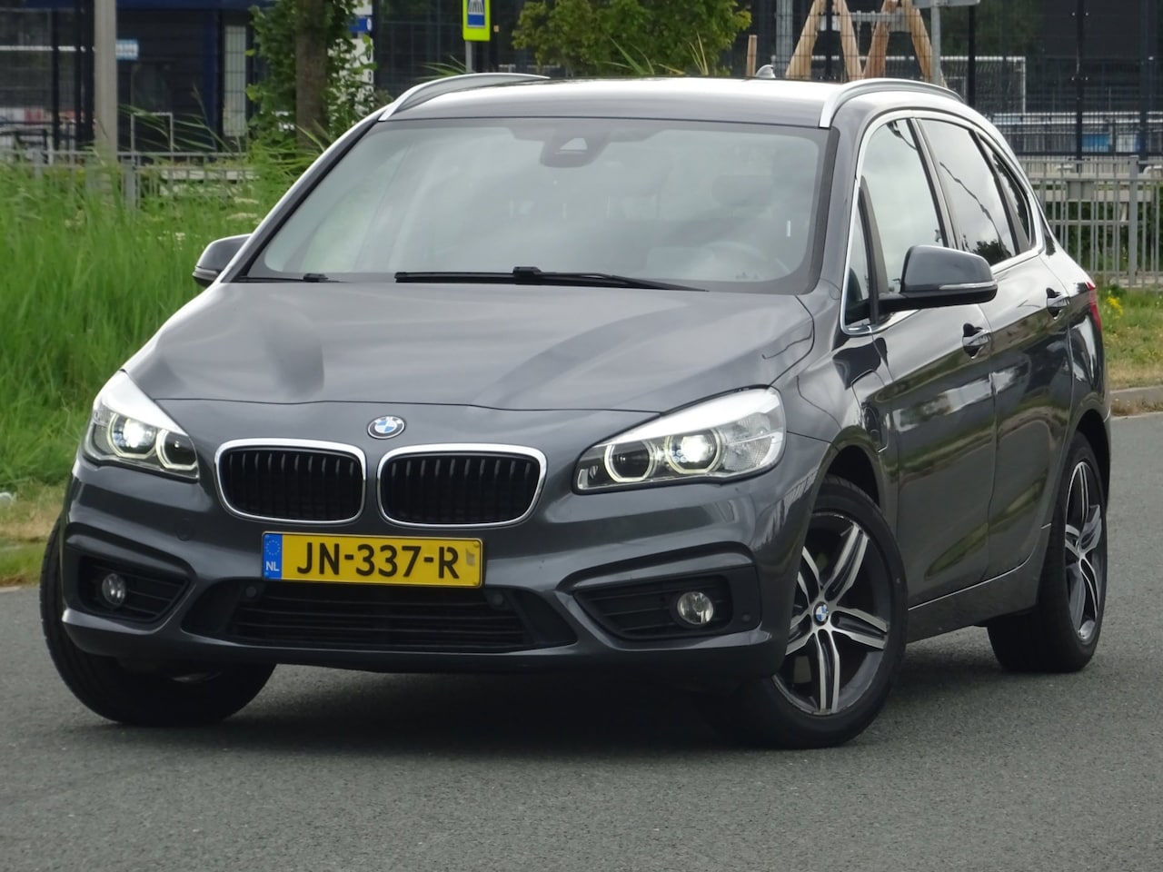 BMW 2-serie Active Tourer - 225xe NAP/LEER/NAVI/CAMERA/HEAD-UP - AutoWereld.nl