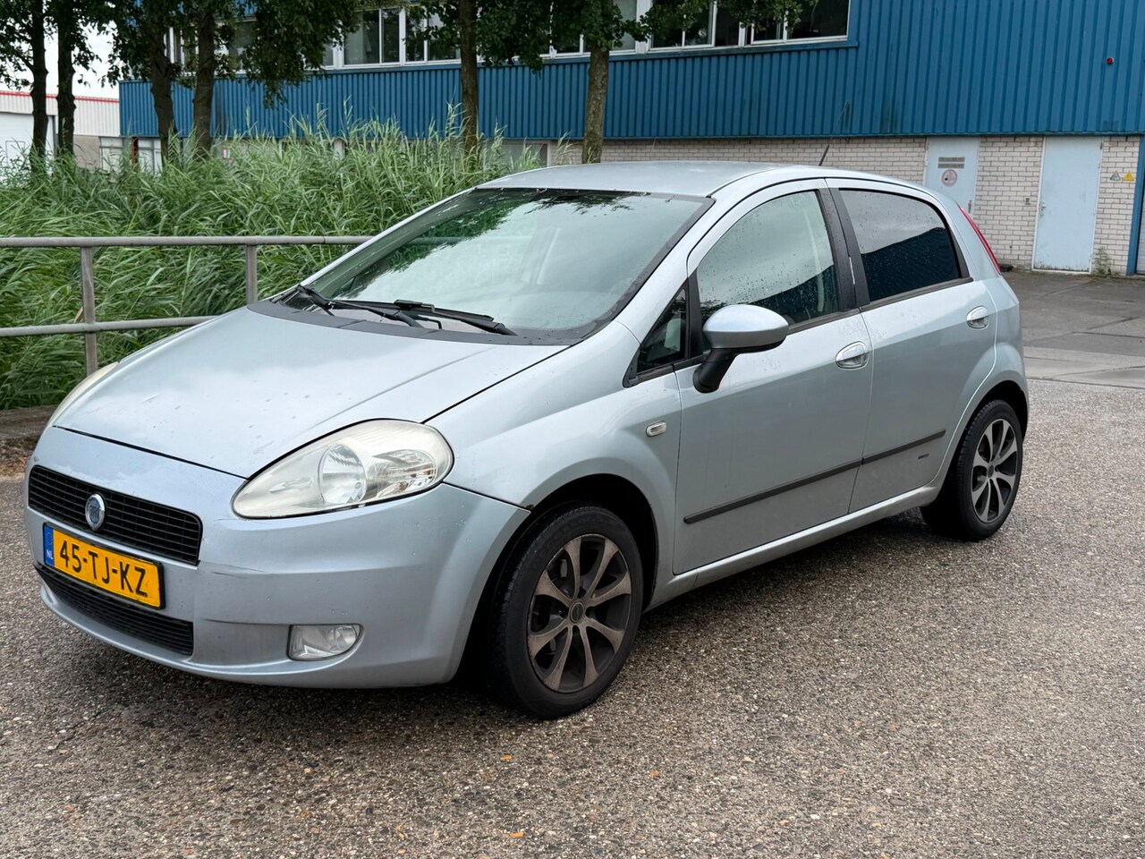 Fiat Grande Punto - 1.2 Edizione Cool Airco 5 drs APK - AutoWereld.nl