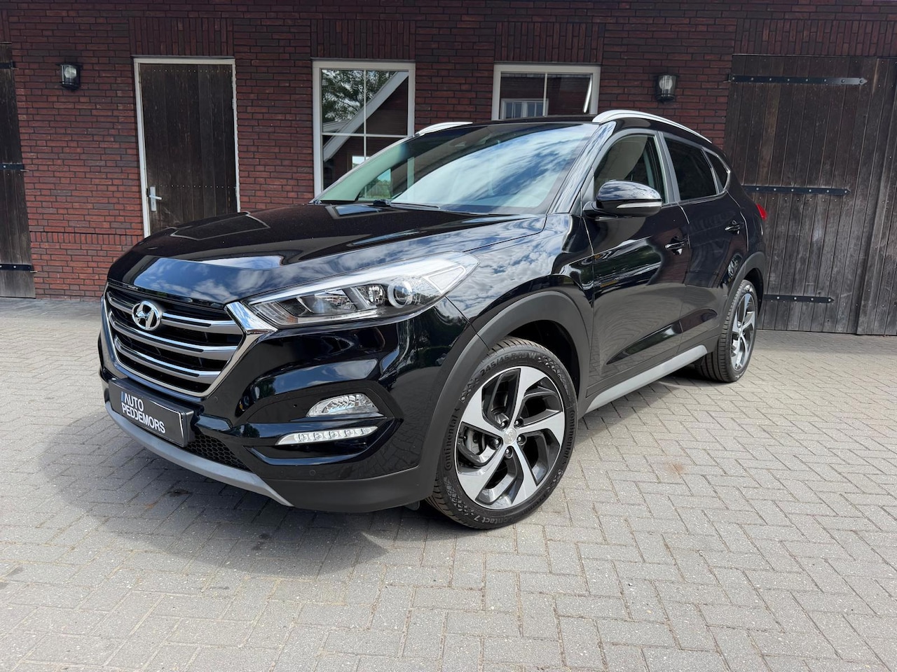 Hyundai Tucson - 1.6 T-GDI Premium| Automaat| Camera| Leder - AutoWereld.nl