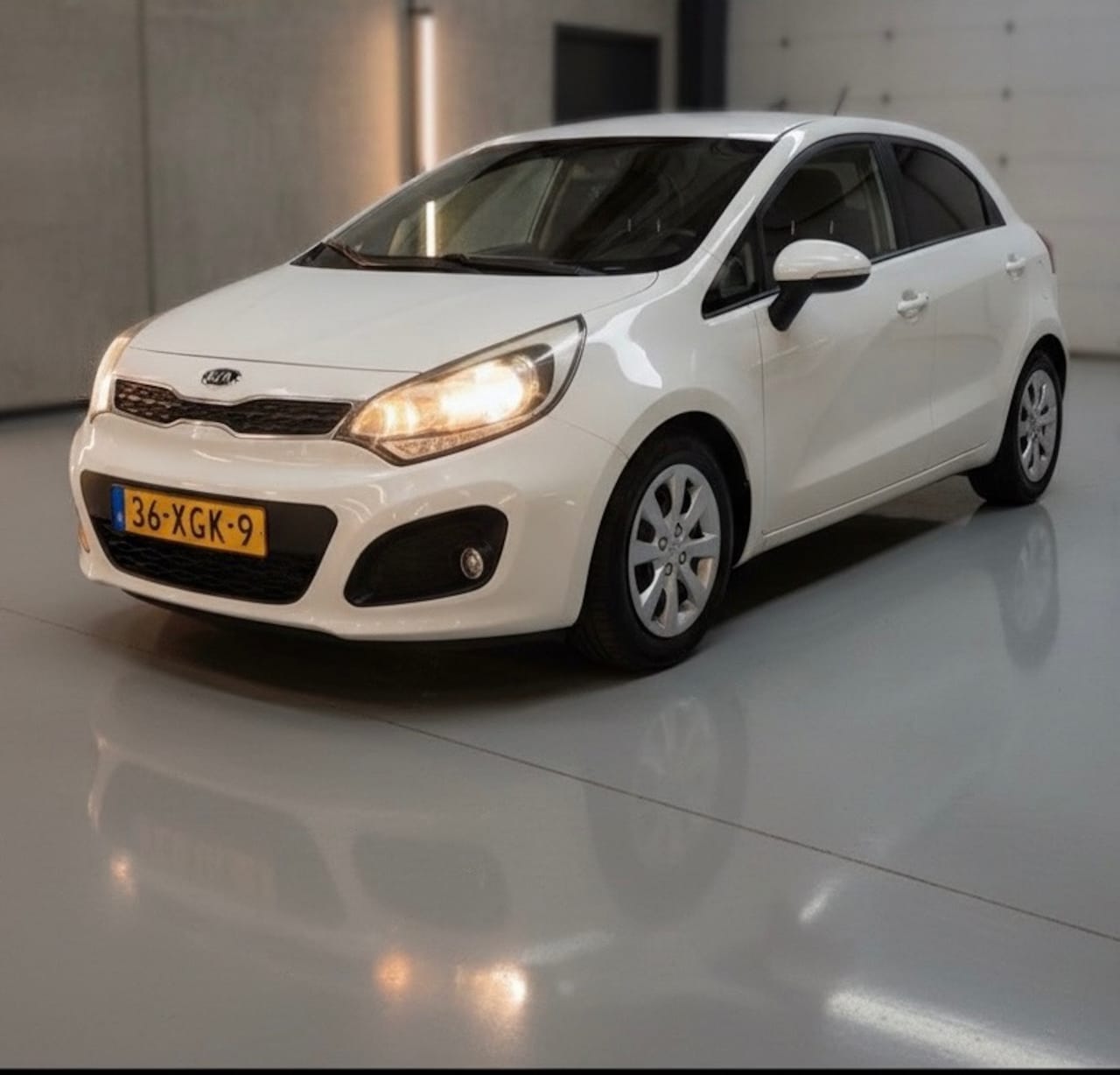 Kia Rio - 1.2 CVVT Super Pack-airco-1 jaar apk-elek ramen-pdc sensoren - AutoWereld.nl